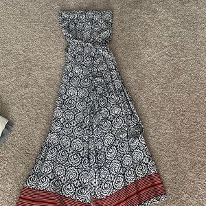 Strapless jumpsuit with tie around waist